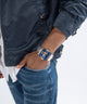 GUESS Mens Silver Tone Multi-function Watch lifestyle hand in pocket