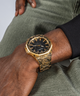 GW0700G1 GUESS Mens Gold Tone Analog Watch lifestyle black and gold watch