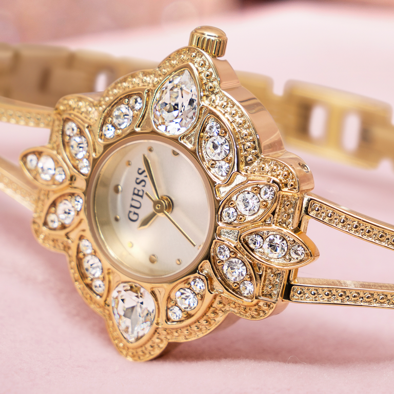 womens gold watch with floral shaped case