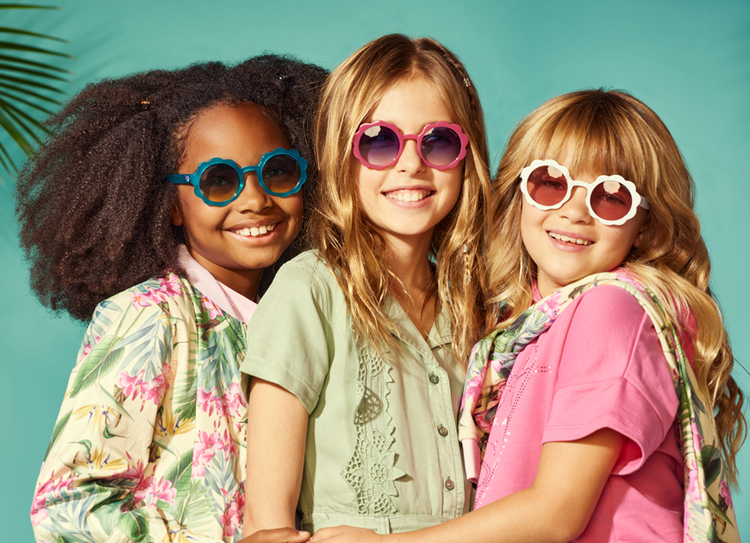 three young girls wearing sunglasses
