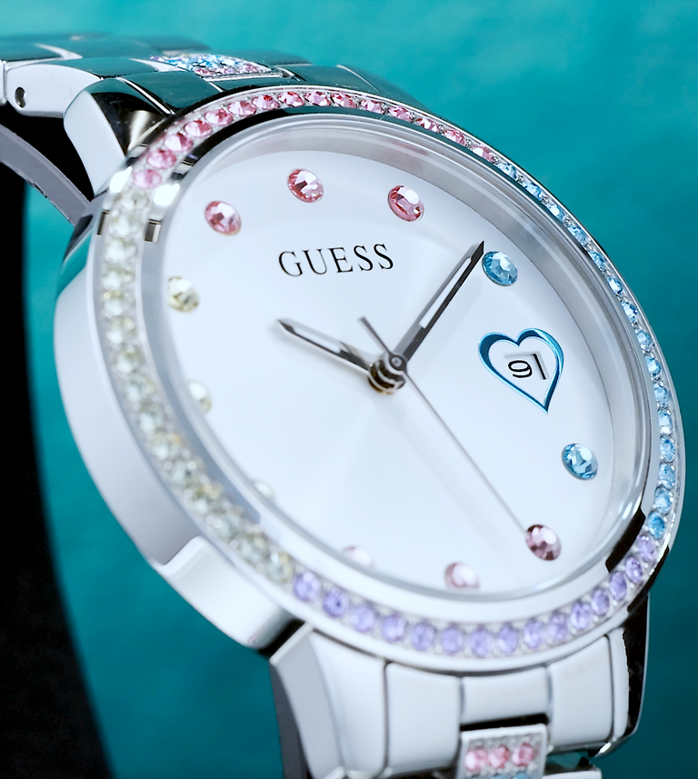 silver watch with hearts on dial