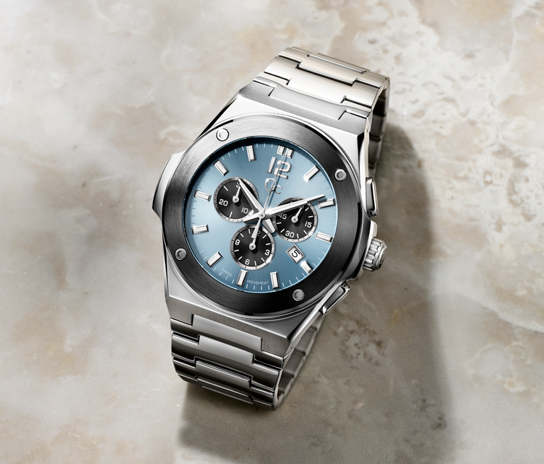 silver and gunmetal Gc watch with light blue dial