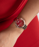 Gc Flair Mid Size Metal lifestyle watch on arm red dial