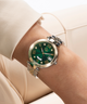 Gc Flair Mid Size Metal lifestyle watch on wrist  with green dial