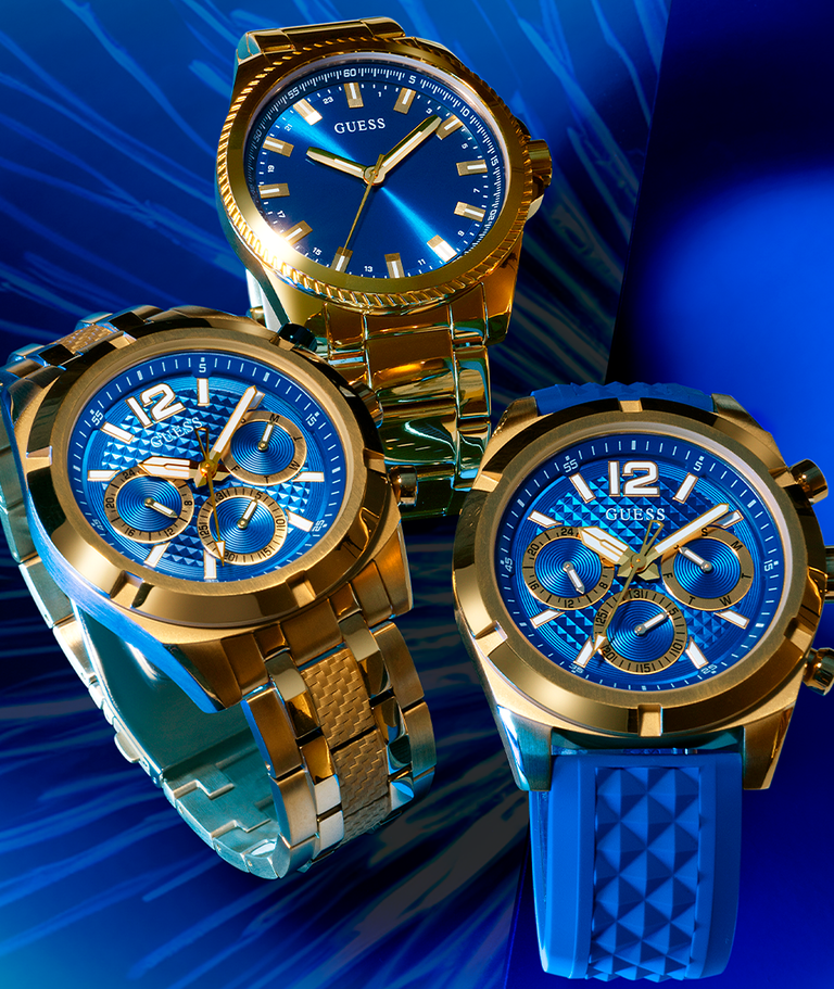 three mens blue sport watches with gold bezels