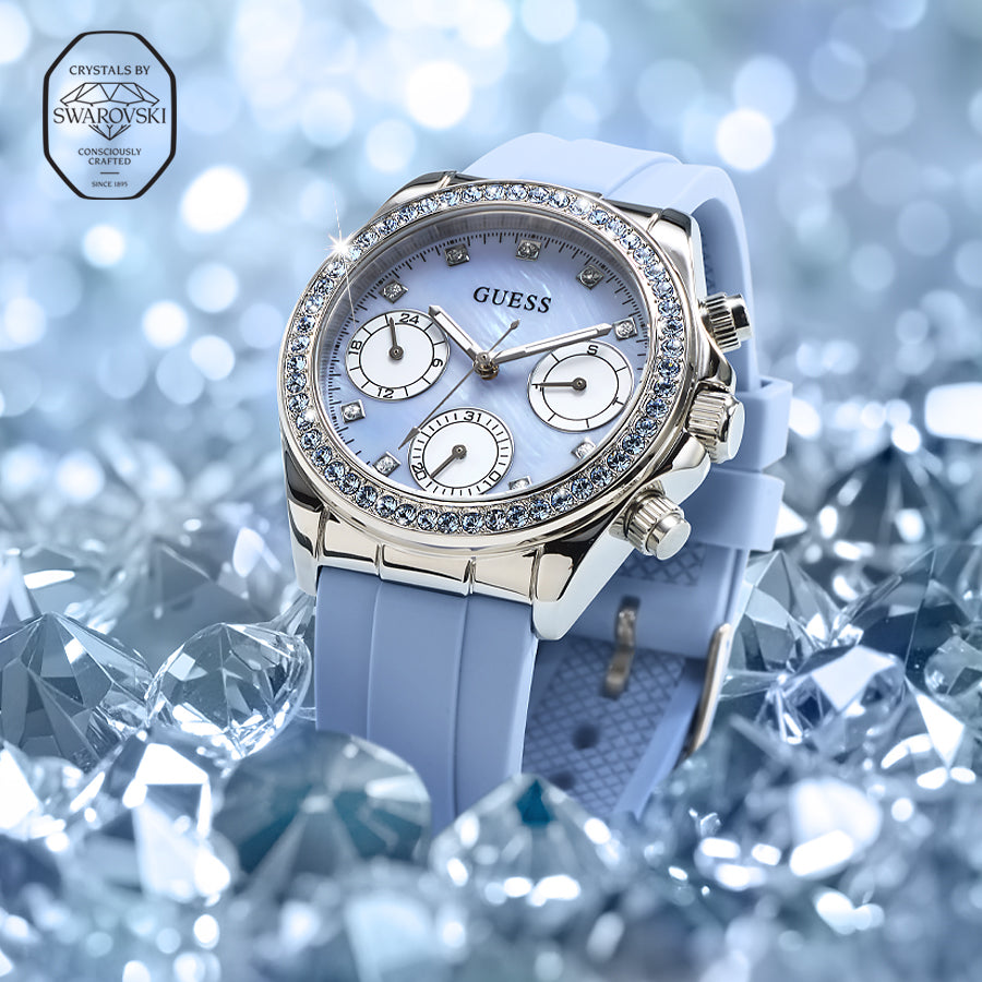Guess watch with Swarovski crystals on a blue background