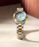 GUESS Ladies 2-Tone Analog Watch lifestyle watch on background