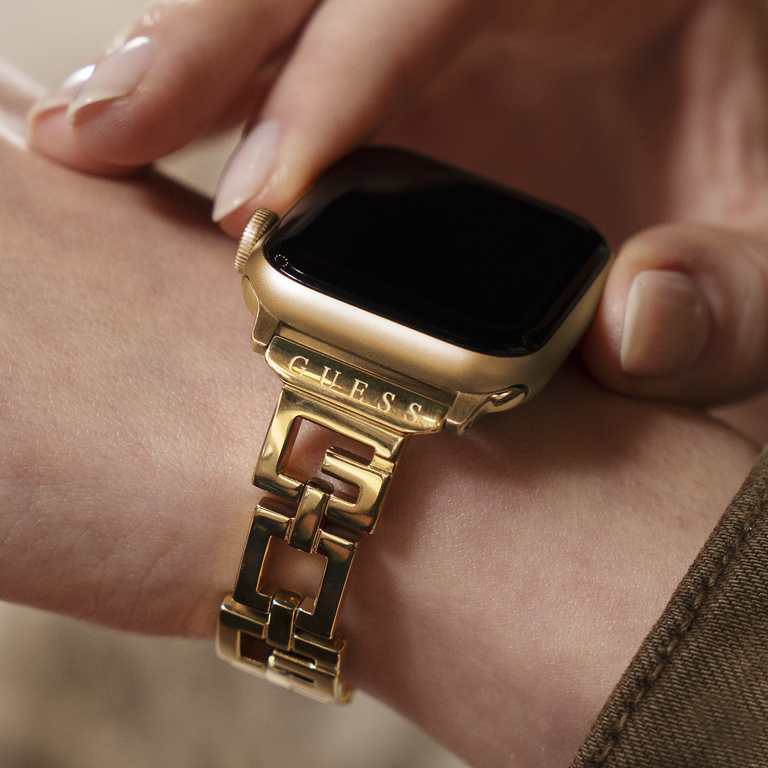 apple watch band in gold with logo highlights