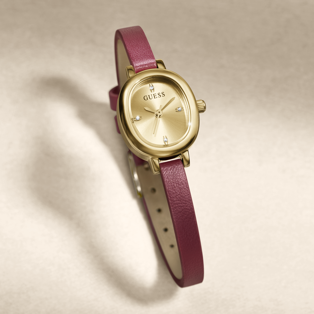 https://guesswatches.com/products/guess-ladies-penelope-burgundy-gold-tone-analog-watch-gw0925l7