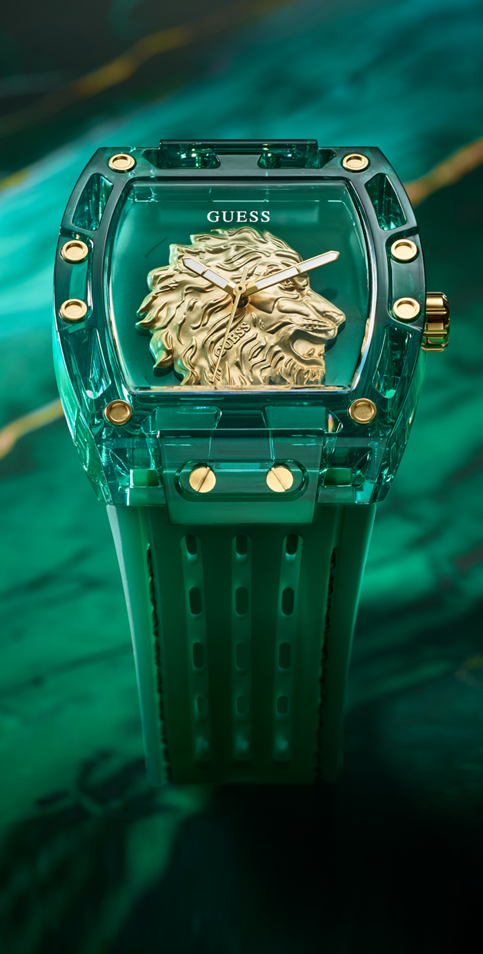Green Guess watch with lion head design on a green background gw0959g2
