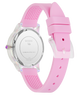 Pink watch with a clear case back on a white background