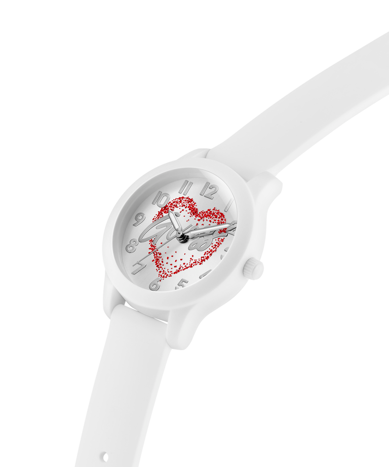 White watch with a heart design on the dial against a white background lifestyle