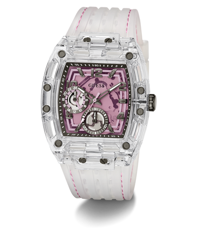 A Guess wristwatch with a transparent clear resin case, a pink skeleton dial, and a white silicone strap with pink stitching, shown on a white background.