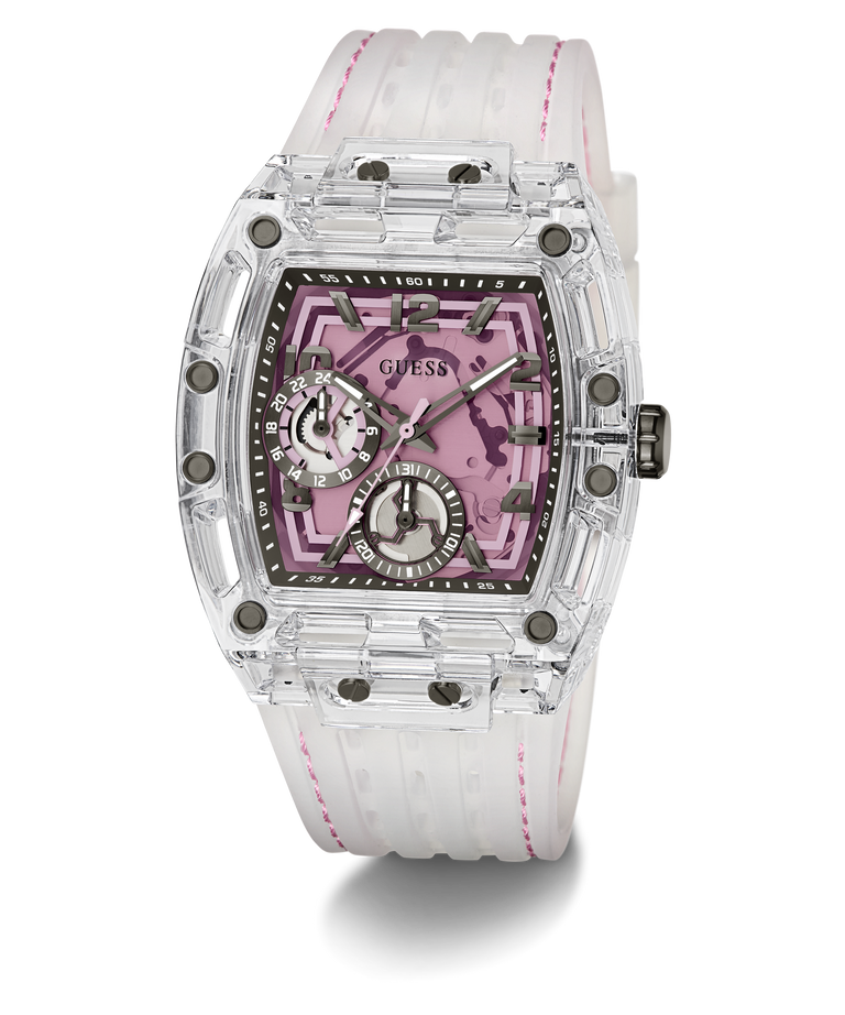 A Guess wristwatch with a transparent clear resin case, a pink skeleton dial, and a white silicone strap with pink stitching, shown on a white background.