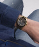 GW0220G2 GUESS Mens Gold Tone Day/Date Watch watch on wrist