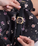GUESS Ladies Black Gold Tone Multi-function Watch lifestyle image