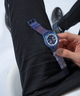 GUESS Eco-Friendly Blue Bio-Based Multi-function Watch lifestyle hand holding watch