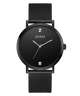 Black Guess watch with mesh band on a white background