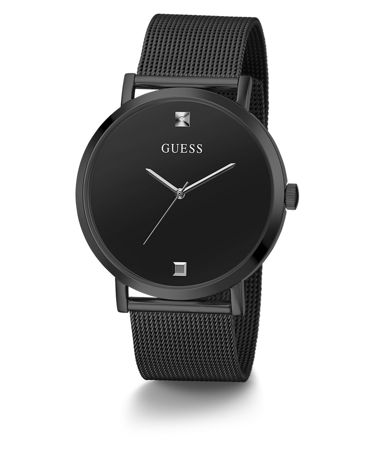Black Guess watch with mesh band on a white background