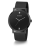 Black Guess watch with mesh band on a white background