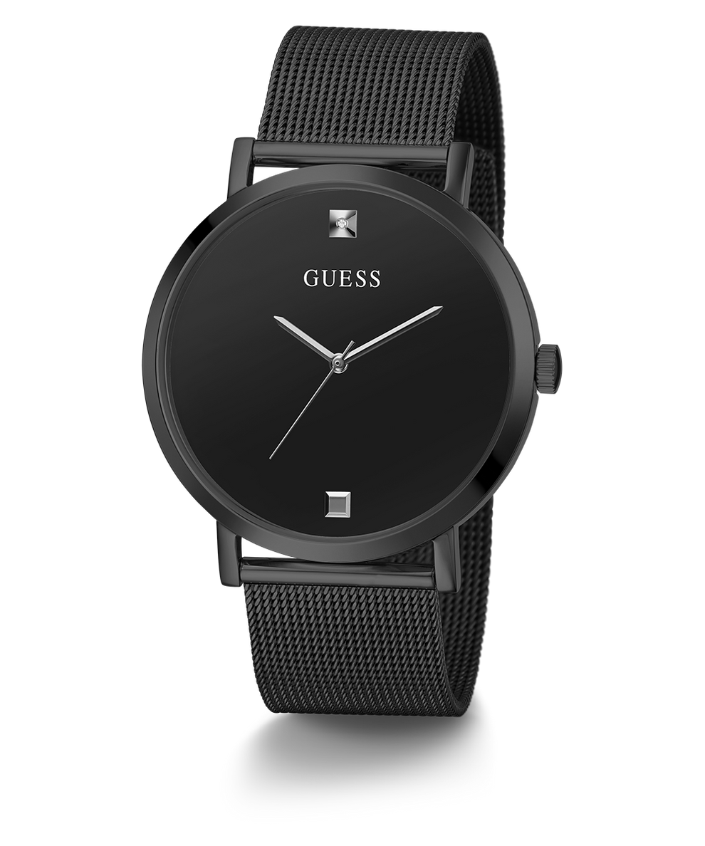 Black Guess watch with mesh band on a white background