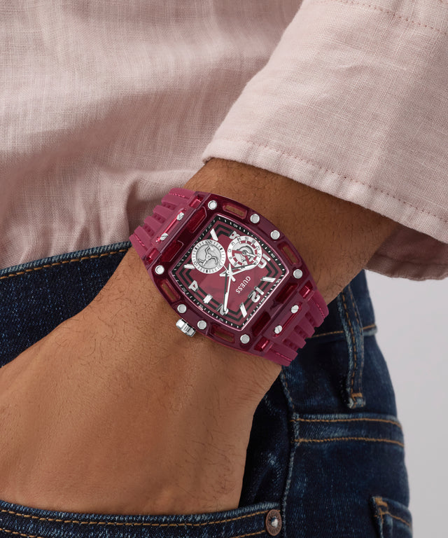 GUESS Mens Red Analog Watch on a wrist with a neutral background