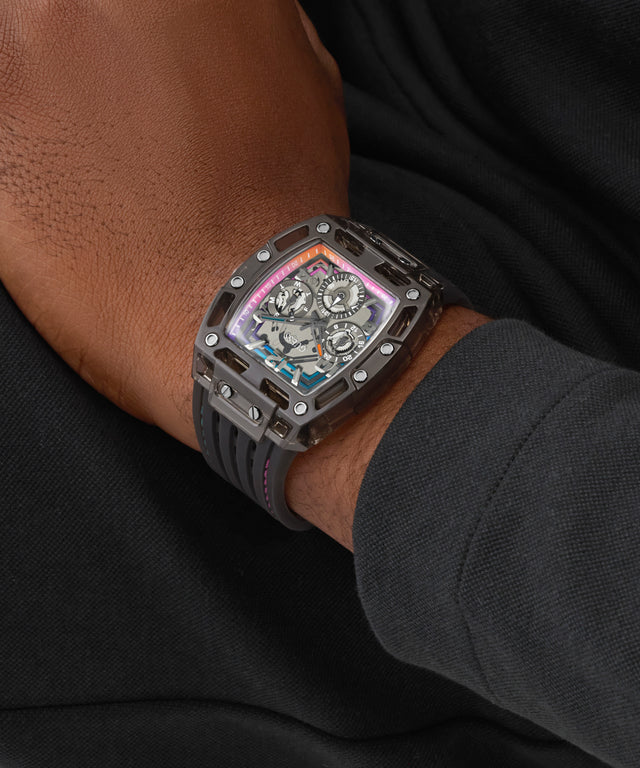 GUESS Mens Black Multifunction Watch on a person's wrist with a dark background