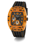 A GUESS men's watch featuring a transparent orange case and a black textured strap with orange stitching, set against a plain white background.