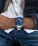 GUESS Mens White Blue Multi-function Watch lifestyle watch on arm