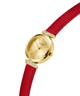 GUESS Ladies Red Gold Tone Analog Watch with a red strap on a white background lifestyle