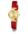 GUESS Ladies Red Gold Tone Analog Watch with a red strap on a white background