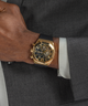 GW0638G1 GUESS Mens Black Gold Multi-function Watch lifestyle black and gold watch on wrist