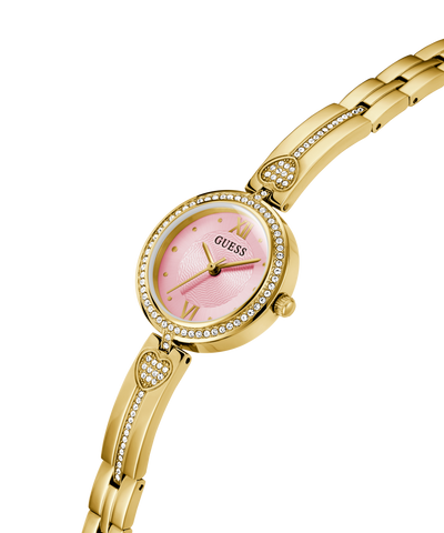 Gold watch with pink face on a white background lifestyle