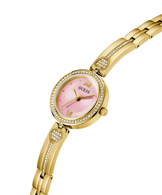 Gold watch with pink face on a white background lifestyle