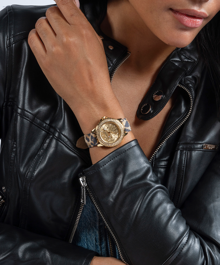 gold and animal strap watch on girl in leather jacket lifestyle