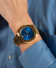 GUESS Mens Gold Tone Analog Watch lifestyle watch on wrist
