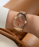 GUESS Ladies Rose Gold Tone Multi-function Watch lifestyle watch on arm