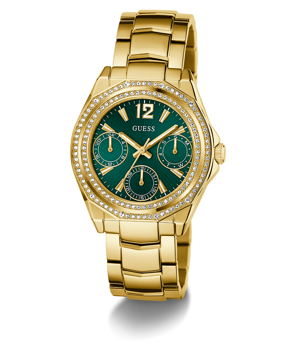 GUESS Ladies Gold Tone Multi-function Watch with a green face and diamond-studded bezel on a white background