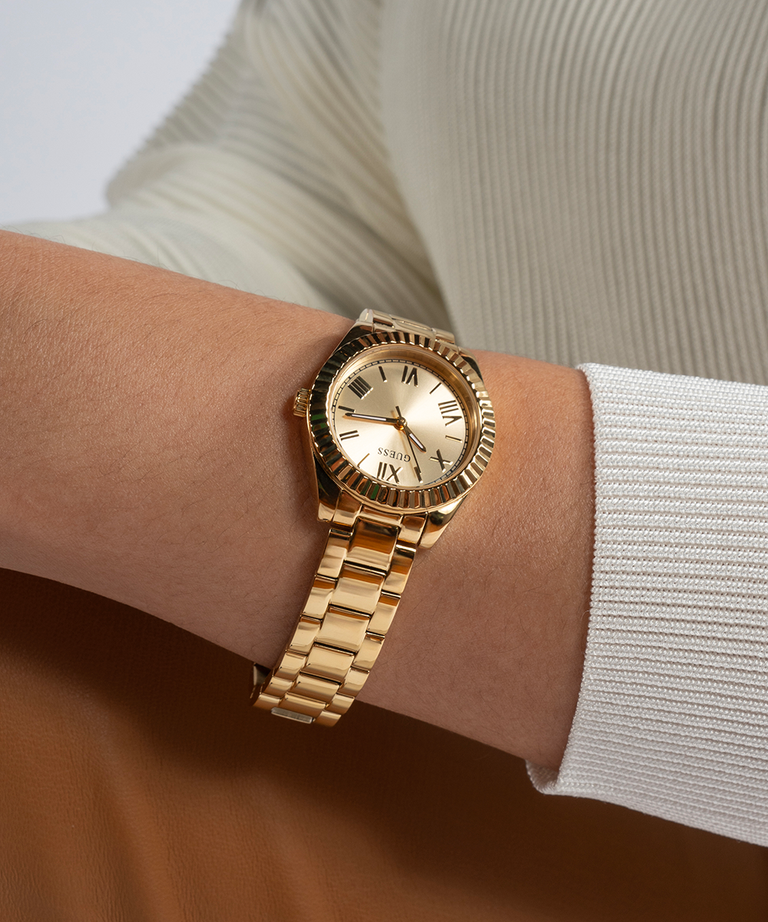 GUESS Ladies Gold Tone Analog Watch lifestyle wrist white shirt