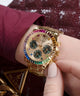 GW0690L4 GUESS Ladies Gold Tone Multi-function Watch watch on arm