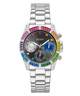 A GUESS women's chronograph watch featuring a silver stainless steel link bracelet, a dark gray dial with silver sub-dials, and a bezel accented with vibrant rainbow-colored crystals.