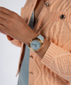 GW0694L1 GUESS Ladies Light Blue Gold Tone Multi-function Watch lifestyle watch on wrist with blue dial