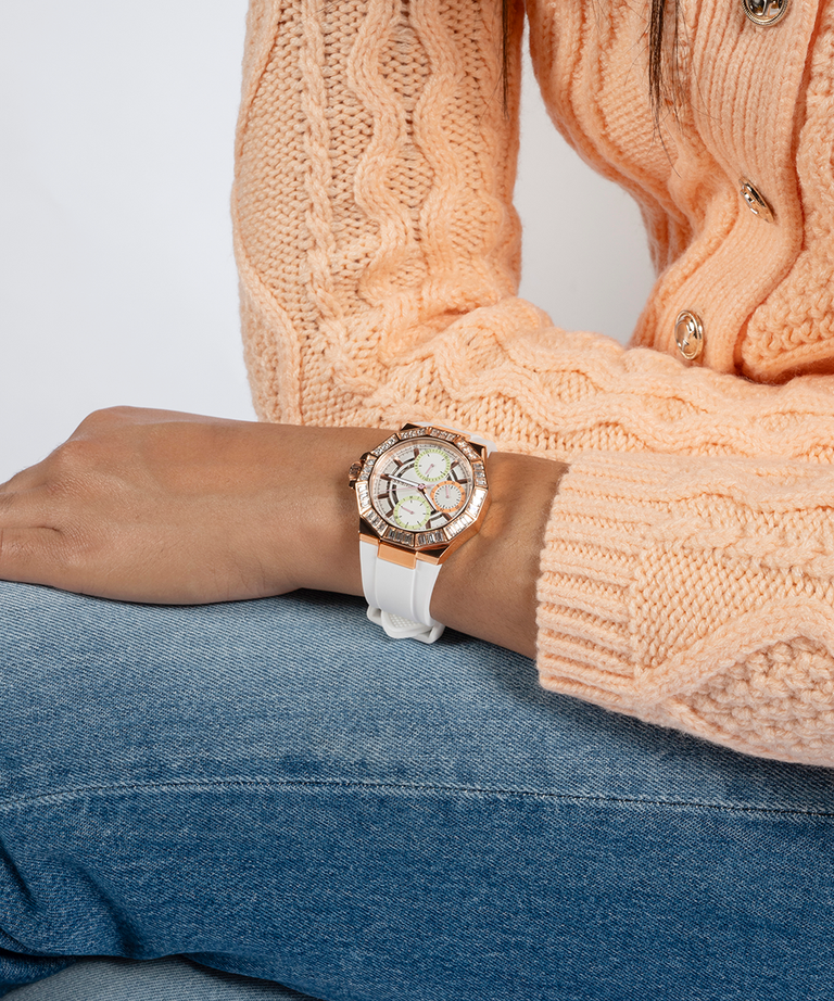 GUESS Ladies White Rose Gold Tone Multi-function Watch lifestyle watch on wrist orange sweater