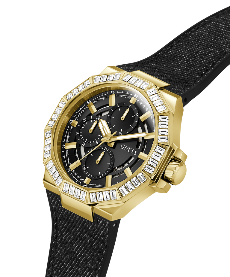 A gold-tone GUESS watch with a black dial, black bezel, and a textured black strap, shown on a plain white background. lifestyle
