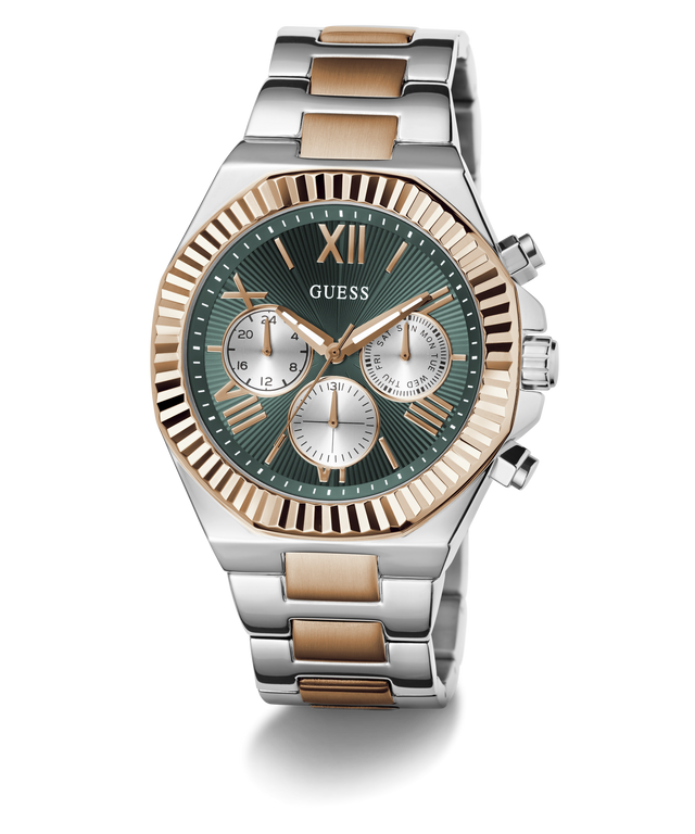 A GUESS men's chronograph watch featuring a two-tone silver and rose gold stainless steel bracelet, a fluted rose gold bezel, and a dark green dial with silver sub-dials.