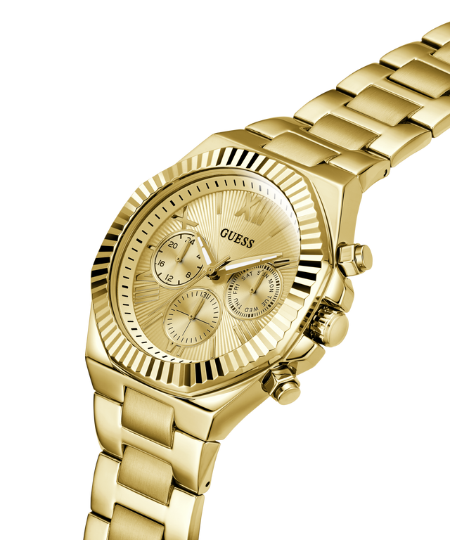 Gold-tone stainless steel wrist watch with a matching link bracelet, featuring a fluted bezel, multi-dial face, and GUESS branding on a clean white background. lifestyle
