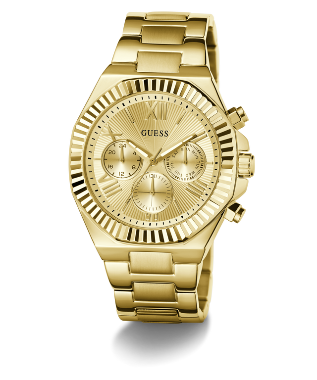 Gold-tone GUESS men's analog watch with a matching metal link bracelet, featuring a fluted bezel, sunburst dial, and three subdials.