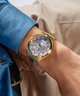 GUESS Mens Gold Tone Multi-function Watch lifestyle watch on arm
