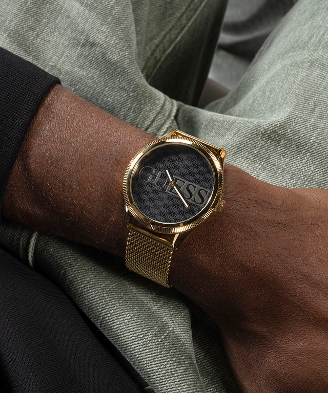 GW0710G2 GUESS Mens Black Gold Tone Analog Watch lifestyle watch on wrist