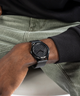 GW0710G3 GUESS Mens Black Analog Watch lifestyle black watch on wrist